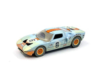 Thumbnail for Auto World x American Diorama 1:64 1965 Ford GT40 Race Worn With Flag Man Figure Limited 4,800 Pieces