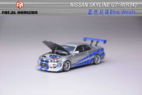 Thumbnail for Focal Horizon 1:64 Nissan Skyline R34 C-West - Silver Blue - Paul Walker