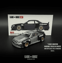 Thumbnail for Mini GT x Kaido House 1:64 Nissan Skyline GT-R R34 Kaido Works GReddy V2 KHMG222 RAW CHASE