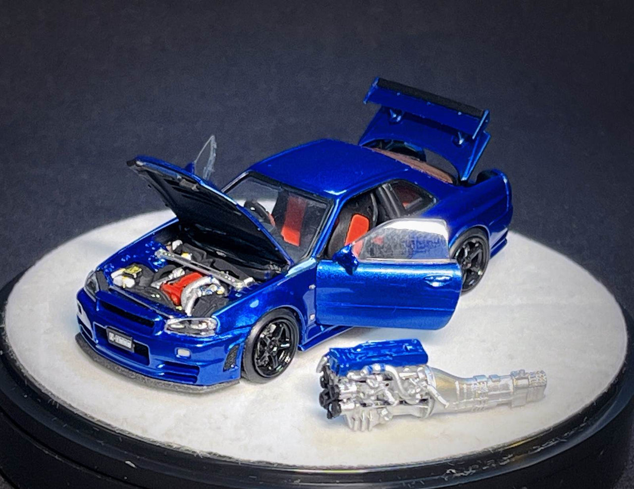 PGM 1:64 Nissan GT-R R34 Z-Tune, Blue with Engine "Luxury w/ Turntable"