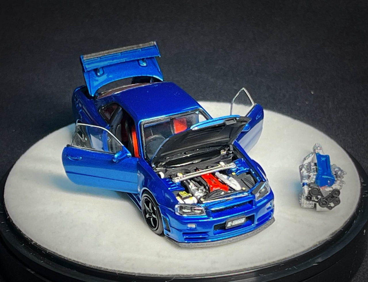PGM 1:64 Nissan GT-R R34 Z-Tune, Blue with Engine "Luxury w/ Turntable"
