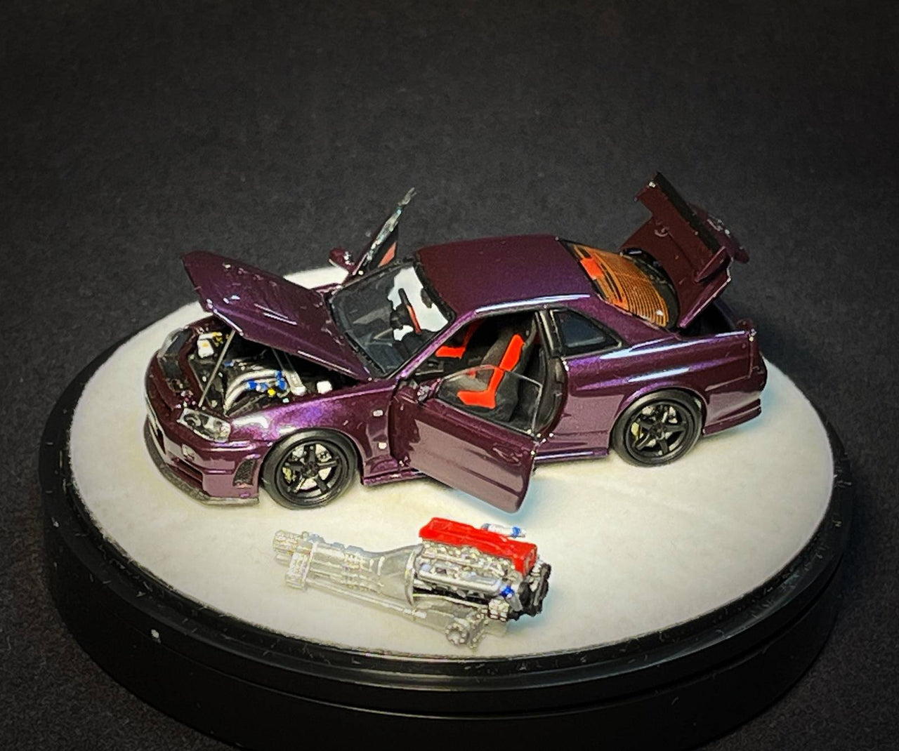 PGM 1:64 Nissan GT-R R34 Z-Tune, Midnight Purple with Engine "Luxury w/ Turntable"