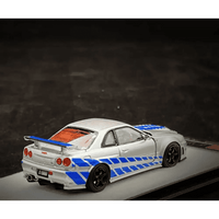 Thumbnail for PGM 1:64 Nissan GT-R R34 Z-Tune Silver W/ Blue Stripe PAUL WALKER