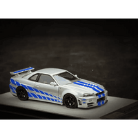 Thumbnail for PGM 1:64 Nissan GT-R R34 Z-Tune Silver W/ Blue Stripe PAUL WALKER