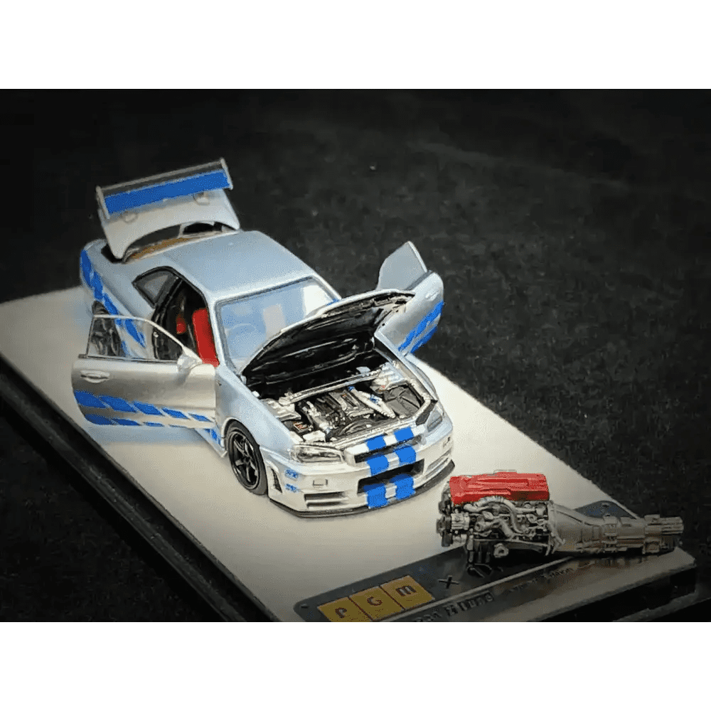 PGM 1:64 Nissan GT-R R34 Z-Tune Silver W/ Blue Stripe PAUL WALKER