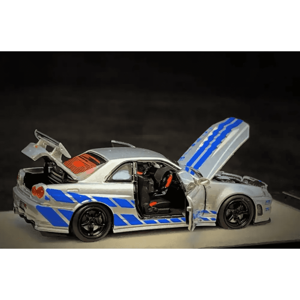 PGM 1:64 Nissan GT-R R34 Z-Tune Silver W/ Blue Stripe PAUL WALKER