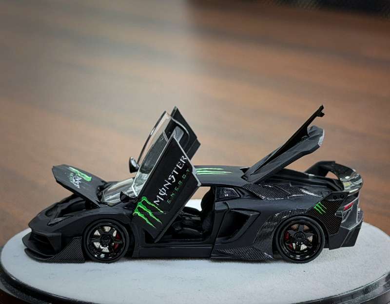 (PRE-ORDER) PGM 1:64 Lamborghini LBWK LP700 Luxury w/ Turntable Monster Energy
