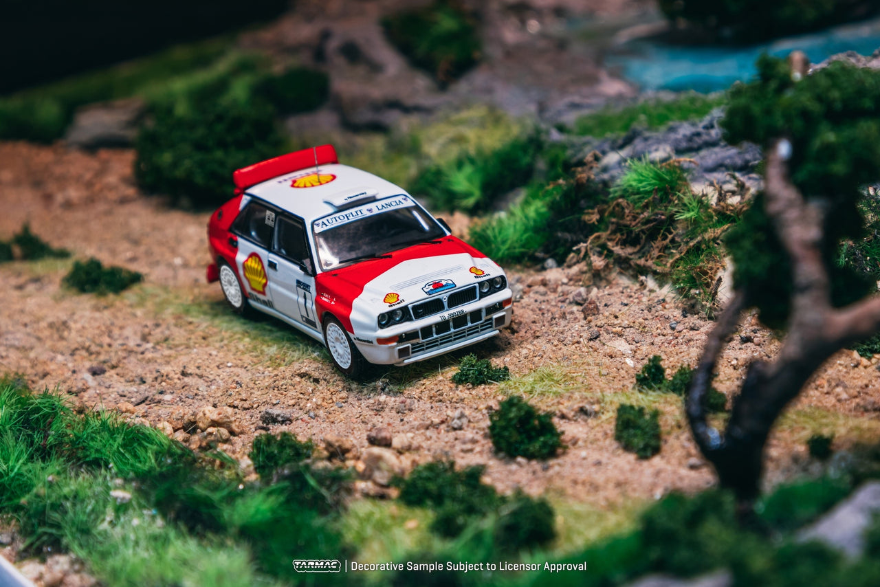 PRE-ORDER Tarmac Works 1:64 LLancia Delta HF Integrale, Mogürt-Salgó Rallye 1993 Winner