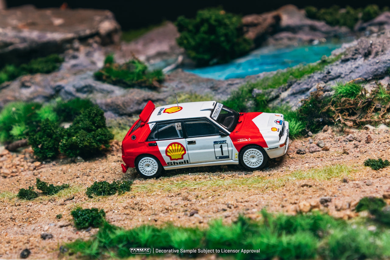 PRE-ORDER Tarmac Works 1:64 LLancia Delta HF Integrale, Mogürt-Salgó Rallye 1993 Winner