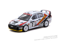 Thumbnail for PRE-ORDER Tarmac Works 1:64 Mitsubishi Carisma GT Evolution IV, RAC Rally 1997, Richard Burns / Robert Reid