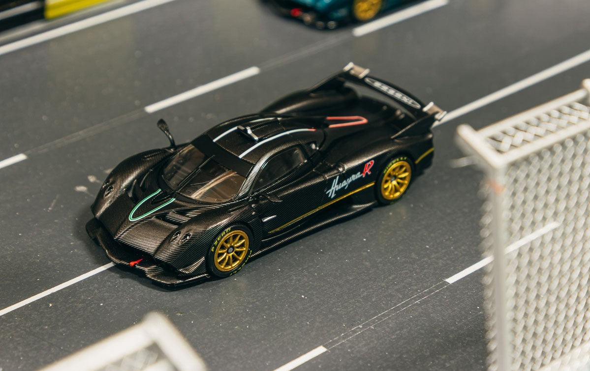 PRE-ORDER Tarmac Works 1:64 Pagani Huayra R Black Carbon Fibre