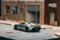 Thumbnail for Tarmac Works 1:64 Koenigsegg Regera, Silver Metallic / Blue Accents w/ Trading Cards