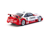 Thumbnail for Tarmac Works 1:64 Nissan NISMO GT-R LM 24h of Le Mans 1995 Presentation K. Hoshino / T. Suzuki / M. Kageyama