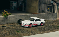 Thumbnail for Tarmac Works 1:64 Porsche 911 Carrera RS 2.7 Lightweight White/Red