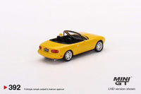 Thumbnail for MINI GT 1:64 Mazda MX-5 Miata NA LHD Sunburst Yellow
